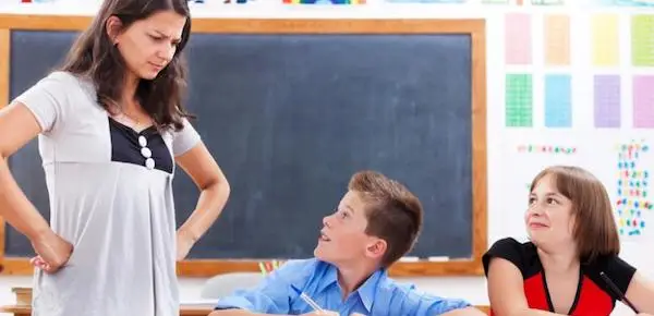 teacher and two kids - Applying Positive Punishment in the Classroom