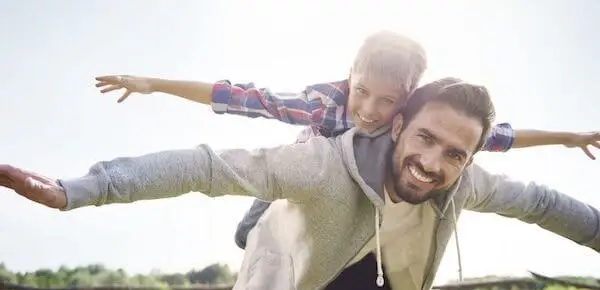 dad playing with kid - neuroplasticity kids and adults 